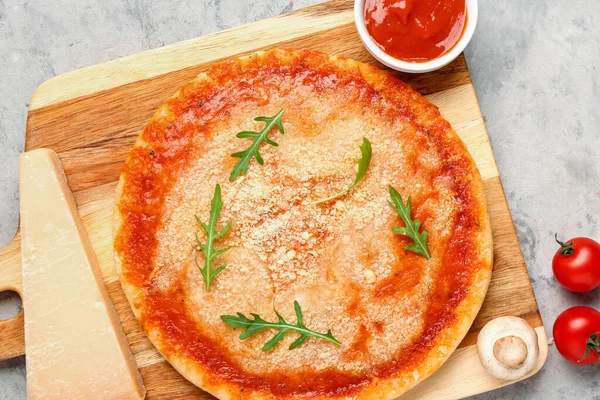Wooden Board Tasty Pizza Parmesan Cheese Tomato Sauce Grey Grunge — Stock Photo, Image