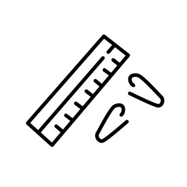 Beyaz arkaplanda ataç ve cetvel