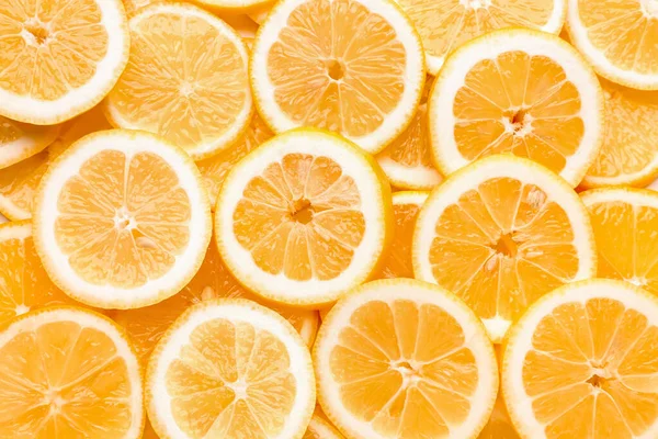 Texture of sliced lemons as background