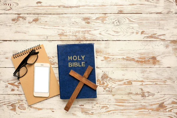 Holy Bible Cross Mobile Phone Eyeglasses Notebook White Wooden Background — Stock Photo, Image