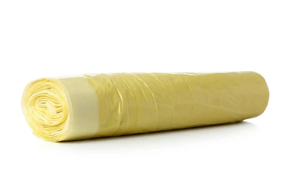 白い背景にゴミ袋の黄色のロール — ストック写真