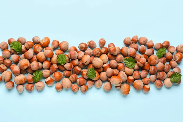 Shelled Hazelnuts Leaves Blue Background — Stock Photo, Image