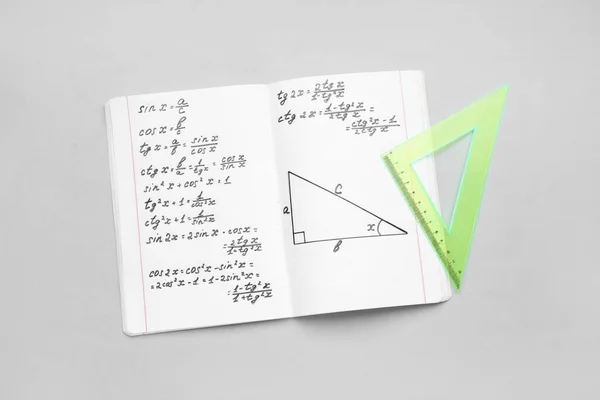 Copybook Con Fórmulas Matemáticas Regla Sobre Fondo Gris —  Fotos de Stock