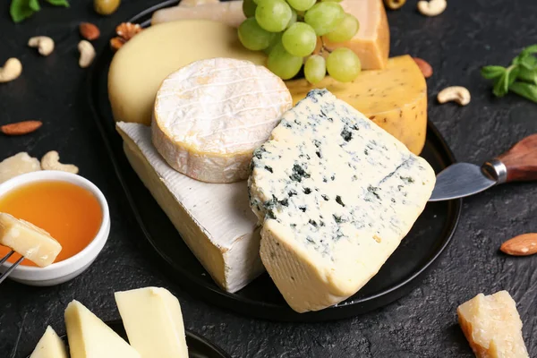 Tray Different Types Tasty Cheese Dark Background — Stock Photo, Image