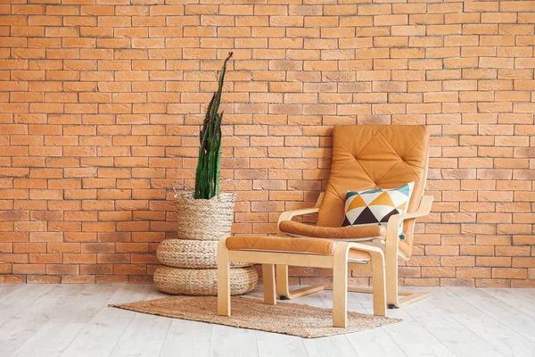 Comfortable Armchair Footstool Big Cactus Pot Brown Brick Wall — Stock Photo, Image