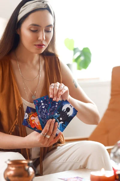 stock image Fortune teller with tarot cards predicting future at home