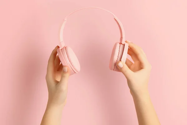 Woman Holding Modern Headphones Pink Background — Stock Photo, Image