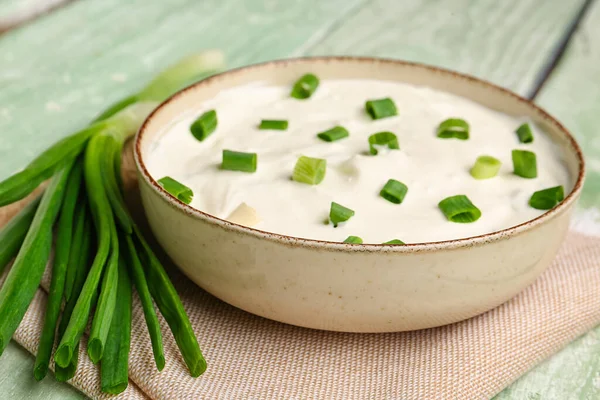 Bowl Delicious Sour Cream Green Onion Light Wooden Background Closeup — Stock Photo, Image