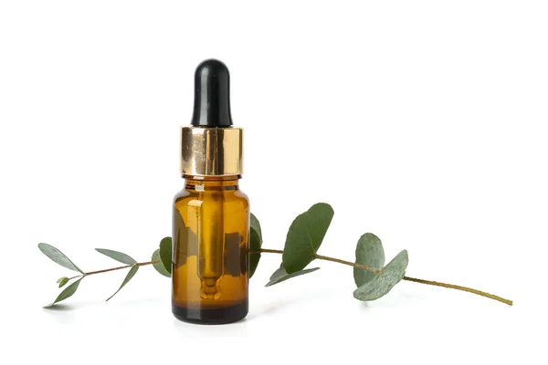 Flaska Med Kosmetisk Olja Och Eukalyptus Gren Vit Bakgrund — Stockfoto