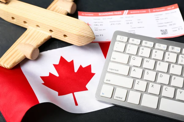 Flag Canada Wooden Airplane Ticket Computer Keyboard Dark Background Closeup — Stock Photo, Image