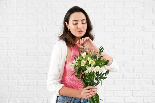 Young Woman Alstroemeria Flowers White Brick Background — Stock Photo, Image