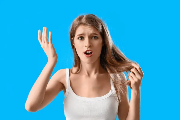 Shocked Young Woman Hair Loss Problem Blue Background — Stock Photo, Image