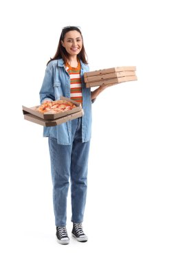 Young woman with cardboard boxes of pizza on white background