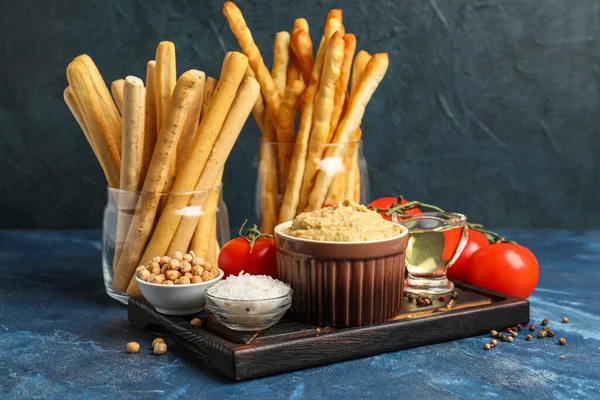 Bowl Tasty Hummus Ingredients Italian Grissini Table — Stock Photo, Image