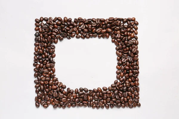 Rahmen Aus Kaffeebohnen Auf Grauem Hintergrund — Stockfoto