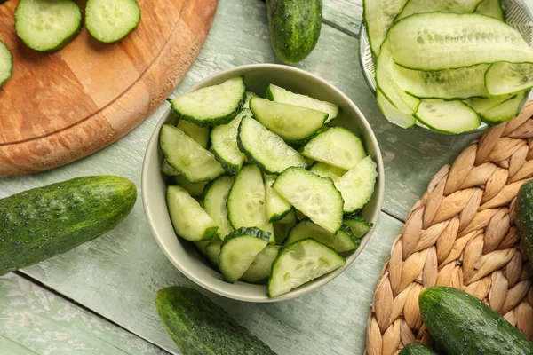 Bowl Pieces Fresh Cucumber Light Wooden Background — Stock Photo, Image