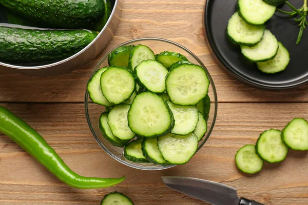 Bowl Pieces Fresh Cucumber Wooden Background — Stock Photo, Image