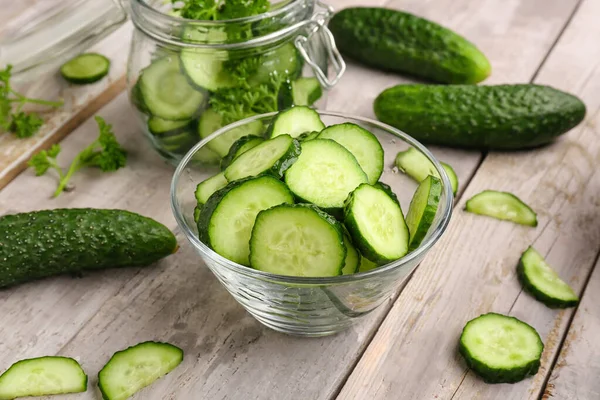 Bowl Fresh Cut Cucumbers Light Wooden Background — Stock Photo, Image