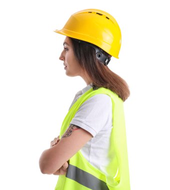 Female worker in vest and hardhat on white background