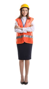 Female worker in vest and hardhat on white background