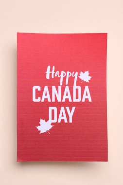 Bej arkaplanda Mutlu Kanadalar Günü yazılı kart