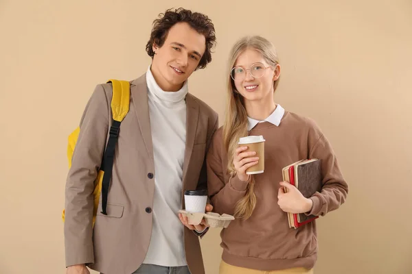 Teenage Couple Cups Coffee Beige Background — Stock Photo, Image