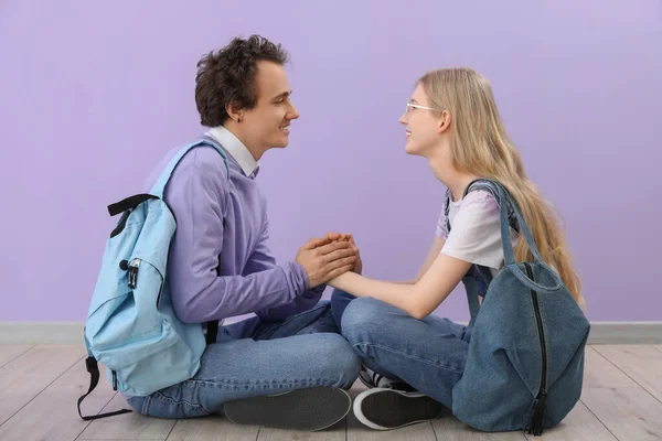 Teenage Couple Holding Hands Lilac Wall — Stock Photo, Image