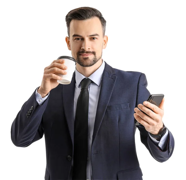 Bonito Empresário Com Xícara Café Telefone Celular Fundo Branco — Fotografia de Stock