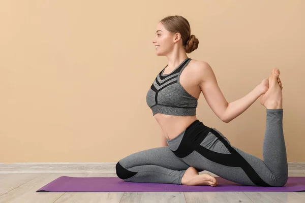 Sporty Young Woman Doing Yoga Indoors — Stock Photo, Image