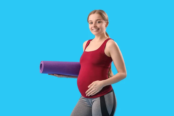 Pregnant Young Woman Yoga Mat Blue Background — Stock Photo, Image