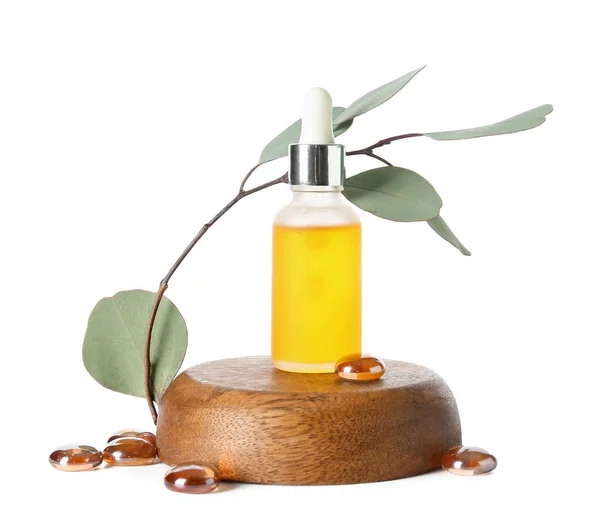 Bottle Cosmetic Oil Wooden Stand Eucalyptus Branch Stones White Background — Stock Photo, Image