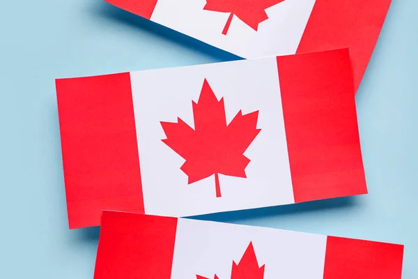 Banderas Papel Canadá Sobre Fondo Azul Primer Plano — Foto de Stock
