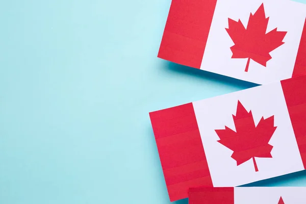 Paper Flags Canada Blue Background Closeup — Stock Photo, Image