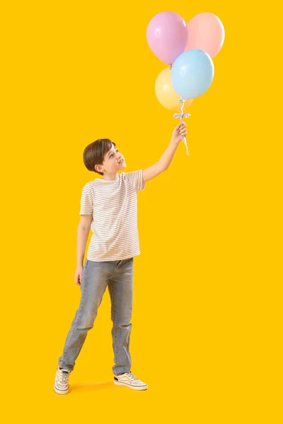 Little Boy Balloons Yellow Background Children Day Celebration — Stock Photo, Image