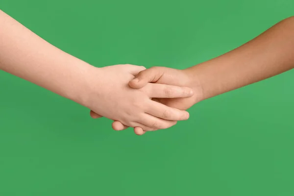 Little Boys Shaking Hands Green Background Closeup Children Day Celebration — Stock Photo, Image