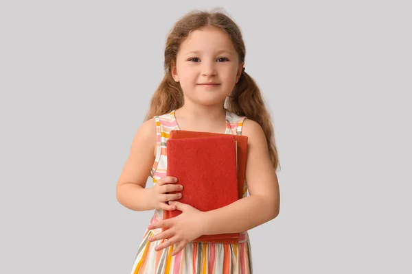 Κοριτσάκι Βιβλία Φόντο Φως Γιορτή Της Ημέρας Των Παιδιών — Φωτογραφία Αρχείου