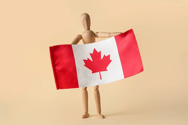 Maniquí Madera Con Bandera Canadá Sobre Fondo Beige — Foto de Stock