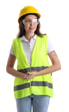 Female worker in vest and hardhat on white background