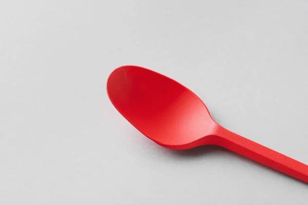 Red Spoon Light Background Closeup — Stock Photo, Image