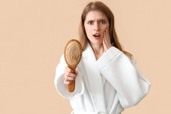 Shocked Young Woman Hair Loss Problem Brush Beige Background — Stock Photo, Image