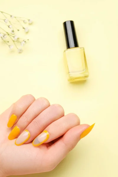 Woman Press Nails Polish Flowers Yellow Background Closeup — Stock Photo, Image