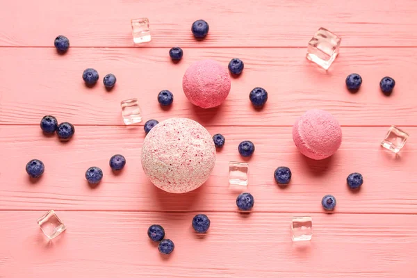 Bath Bombs Blueberry Ice Cubes Pink Wooden Background — Stock Photo, Image