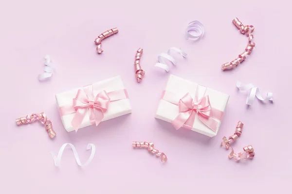 Gift Boxes Beautiful Bows Serpentine Pink Background — Stock Photo, Image