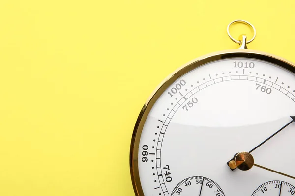 stock image Aneroid barometer on yellow background