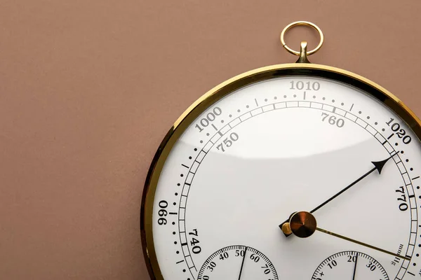 stock image Aneroid barometer on brown background