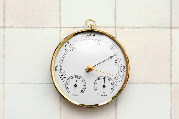 stock image Aneroid barometer on white tiled background