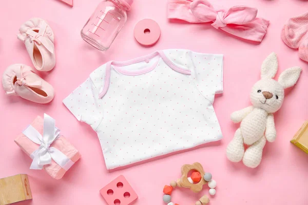 Composition Baby Clothes Toys Accessories Light Pink Background — Stock Photo, Image