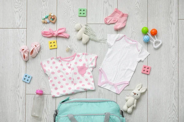 Stylish Clothes Toys Baby Light Wooden Background — Stock Photo, Image