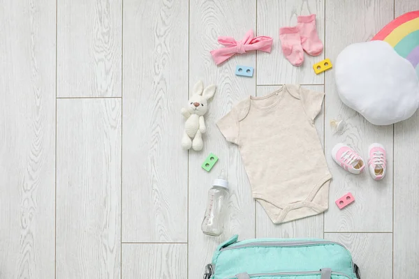 Stylish Clothes Toys Baby Light Wooden Background — Stock Photo, Image