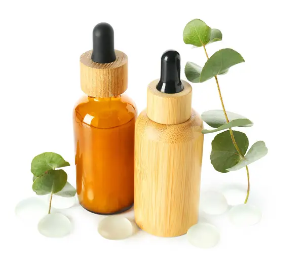 Bottle Cosmetic Oil Eucalyptus Branch Stones White Background — Stock Photo, Image